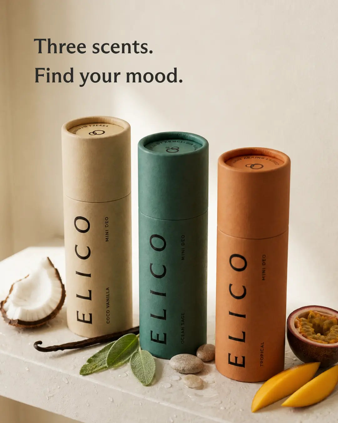 Mini Deo in three scents surrounded by coconut, vanilla pod, sage and mango